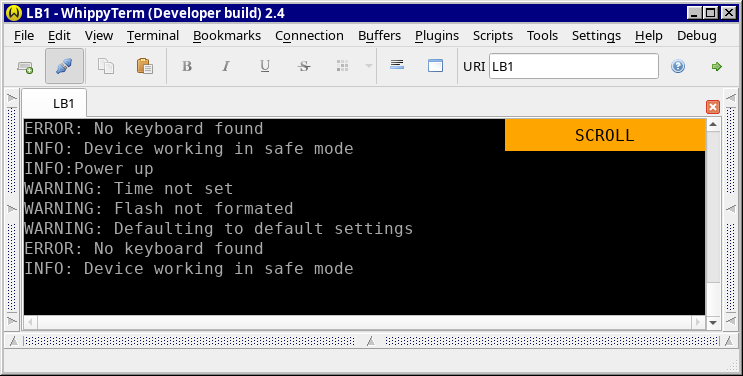 The SCROLL indicator in the top right corner of the display